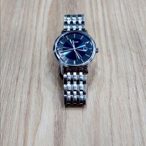 Citizen Eco-Drive E111-S067901 Date Indicator Men's Watch